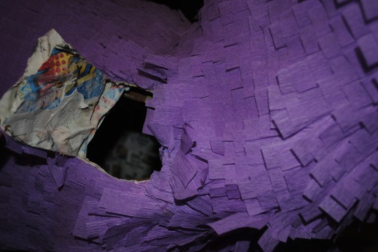 Cutting the candy door in the shoulder.