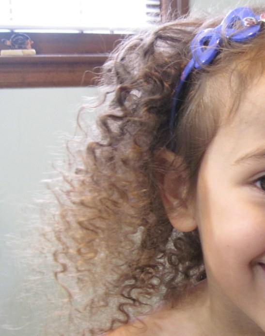 It does settled down to a cute 80s coiffure.